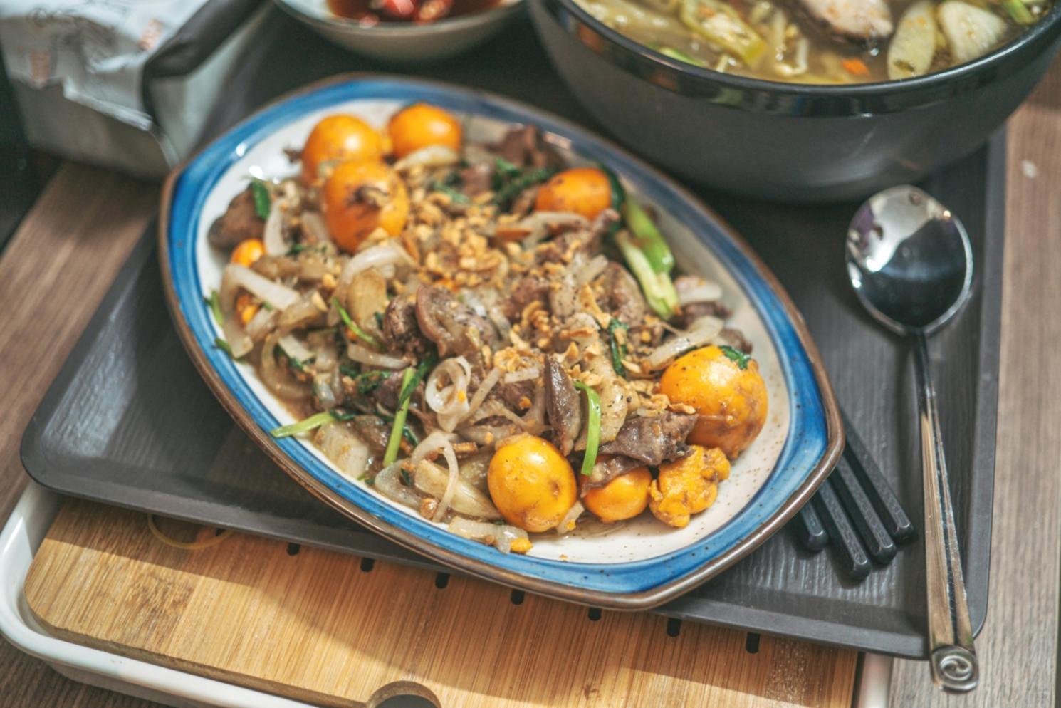 Interactive baking workshop with participants working on pastry techniques